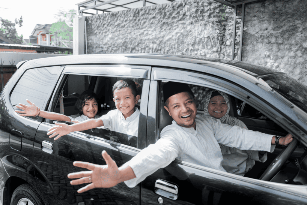 Happy customers inside rental car
